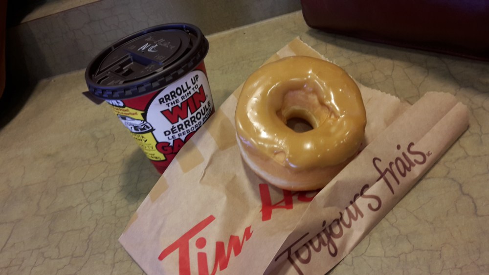 Maple doughnut and hot chocolate in Tim Horton's