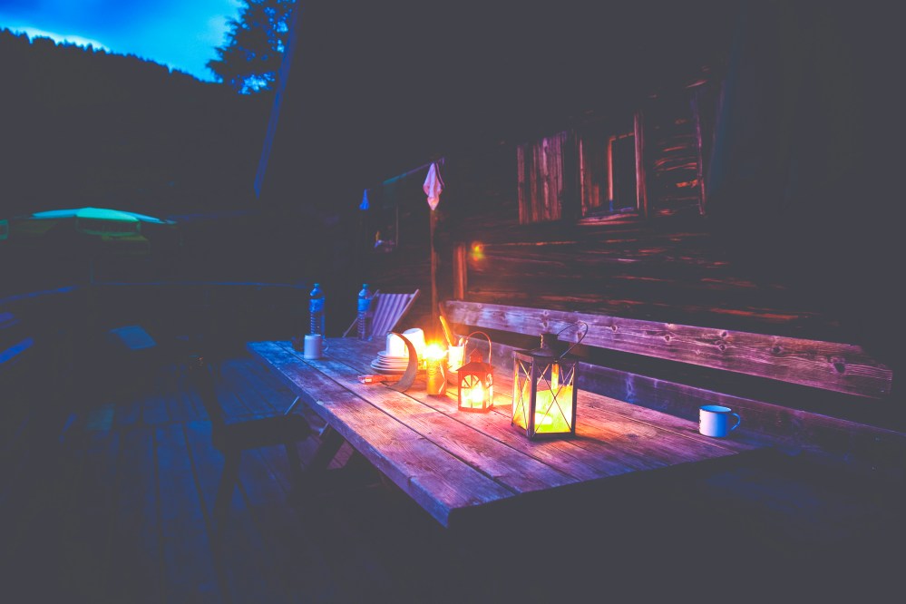 Candles at an outdoor dinner party